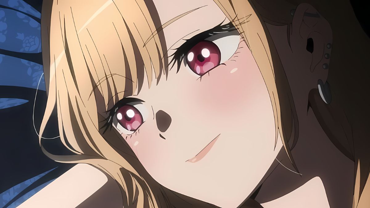 Marin-laying-on-her-side-blushing-and-softly-smiling-in-a-screenshot-from-the-anime